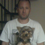 Kristopher Lauchner with our mangy dog