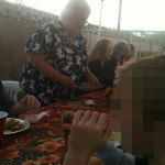 Desiree's extended family having a backyard dinner