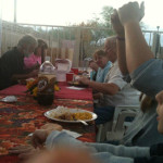 Desiree's extended family having a backyard dinner