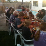 Desiree's extended family having a backyard dinner