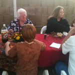 Desiree's extended family having a backyard dinner